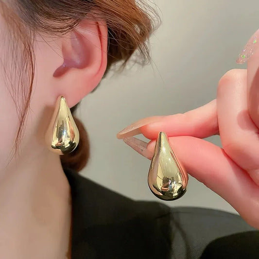 Exaggerate Big Water Drop Earrings For Women Gold Plated Metal Thick Teardrop Stud Earring French Style Top Quality, cheap jewelry in Canada and affordable earrings for women,Add a touch of elegance to your everyday look with these stunning earrings